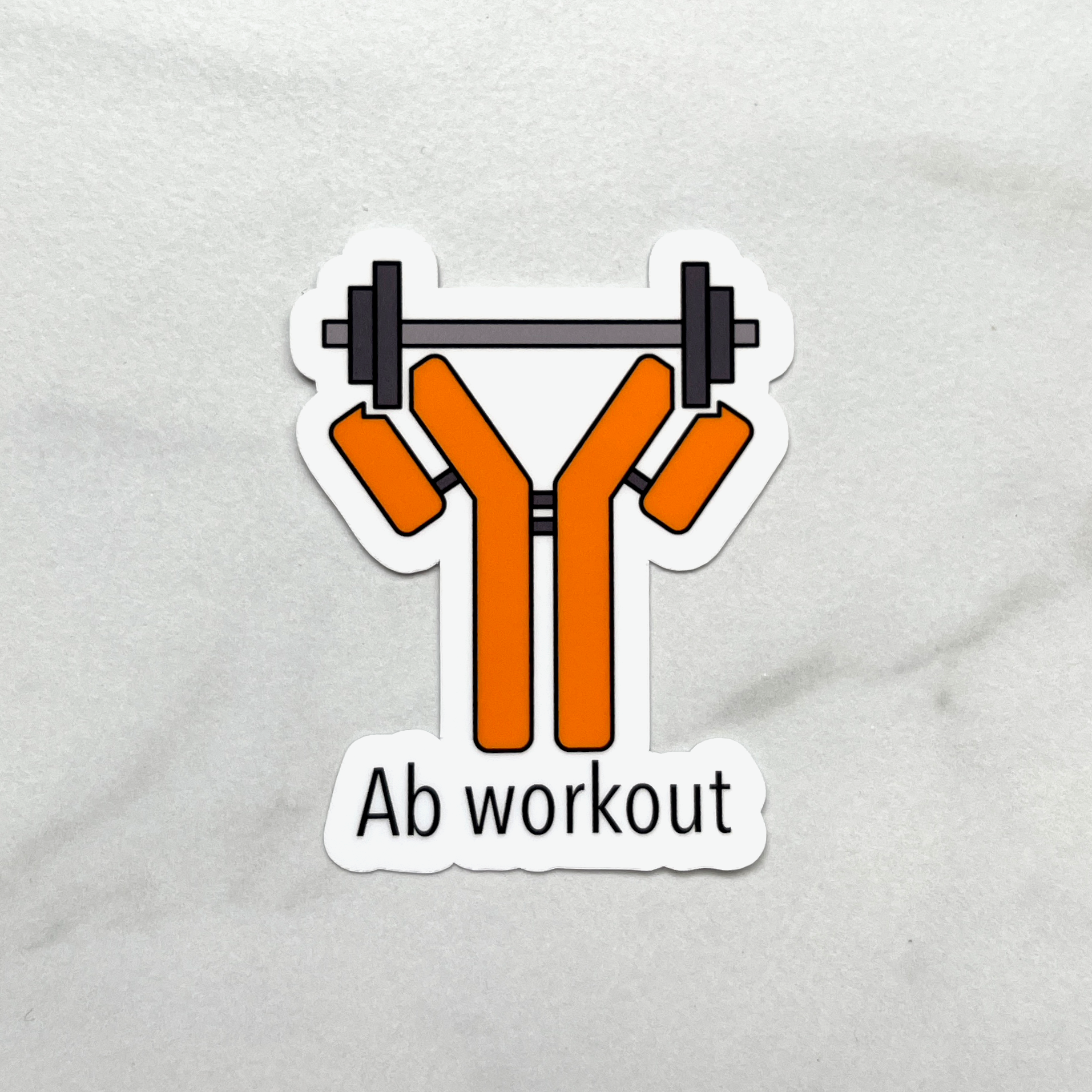 A sticker of an antibody holding a barbell above the text "Ab workout"